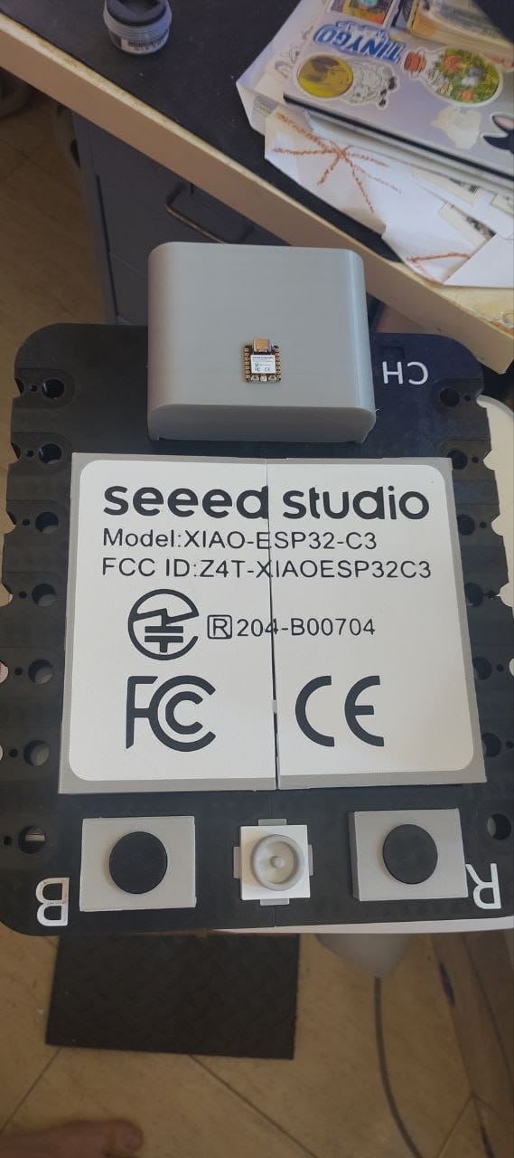 The back label of the giant XIAO, showing the seeed studio branding, model number, FCC ID, and CE/FCC marks - exactly as on the original, 15x larger.